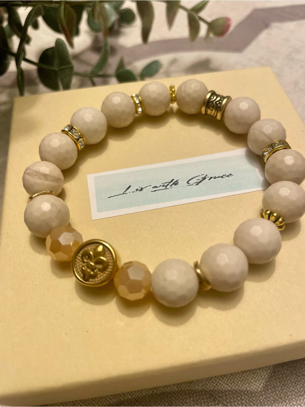 Cream Faceted Sandstone Bracelet, Gold Fleur de Lis gold accents, stretch, 10mm